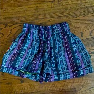 Shorts with floral pattern on back pockets